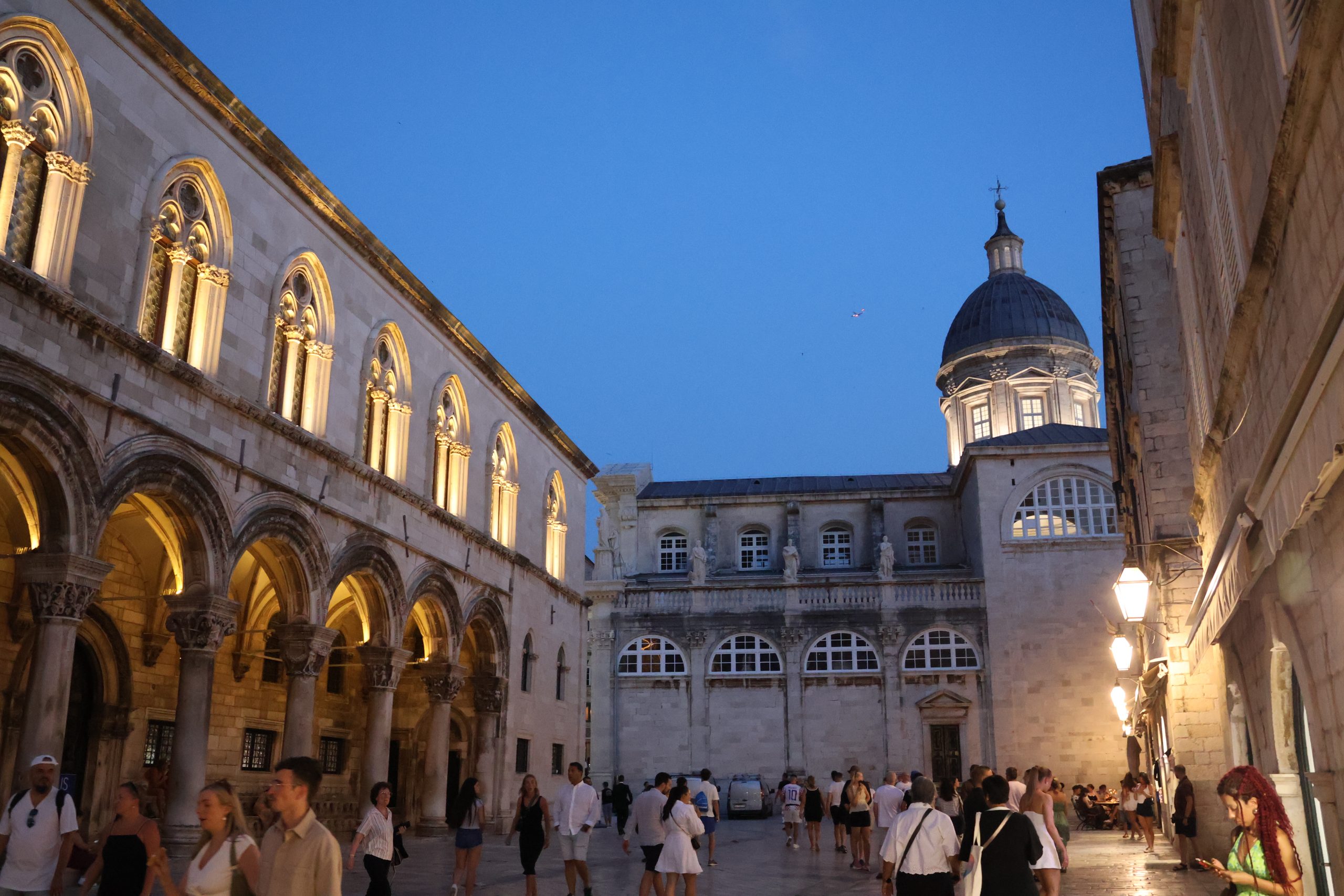 The streets and buildings of Dubrovnik's Old Town at night.