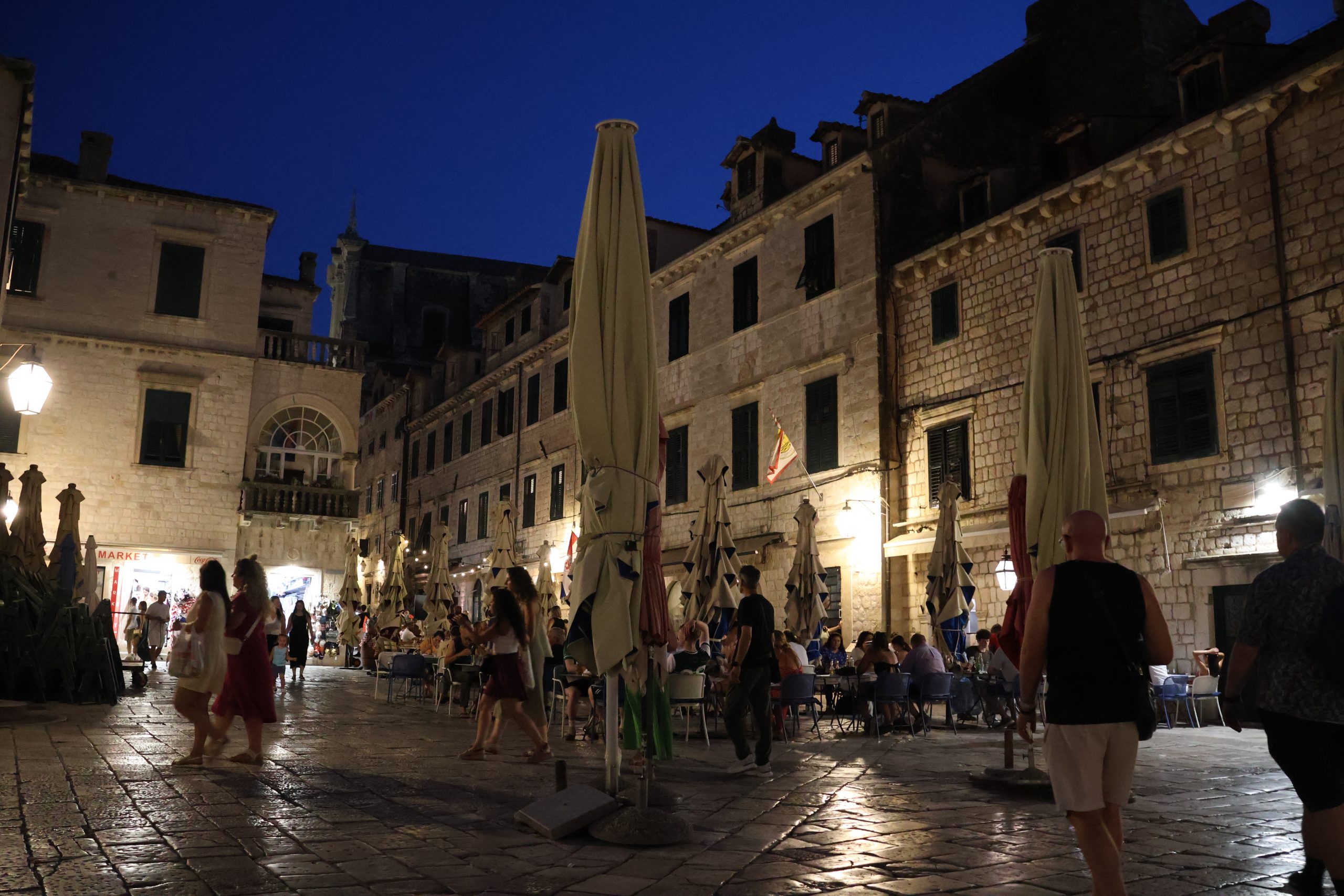 A nighttime scene inside Dubrovnik's historic Old Town.